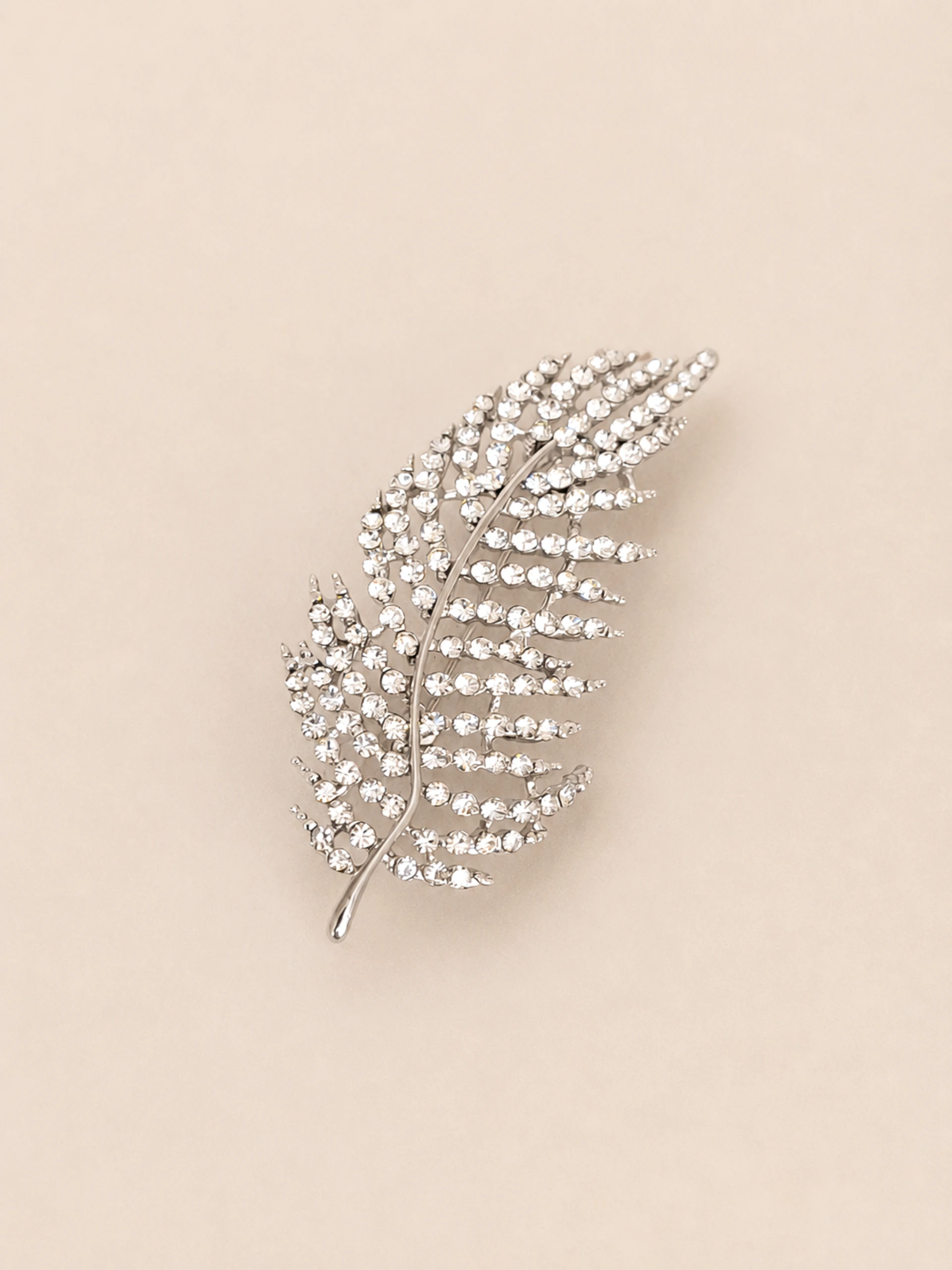 PRENDEDOR PLUMA BRILLO