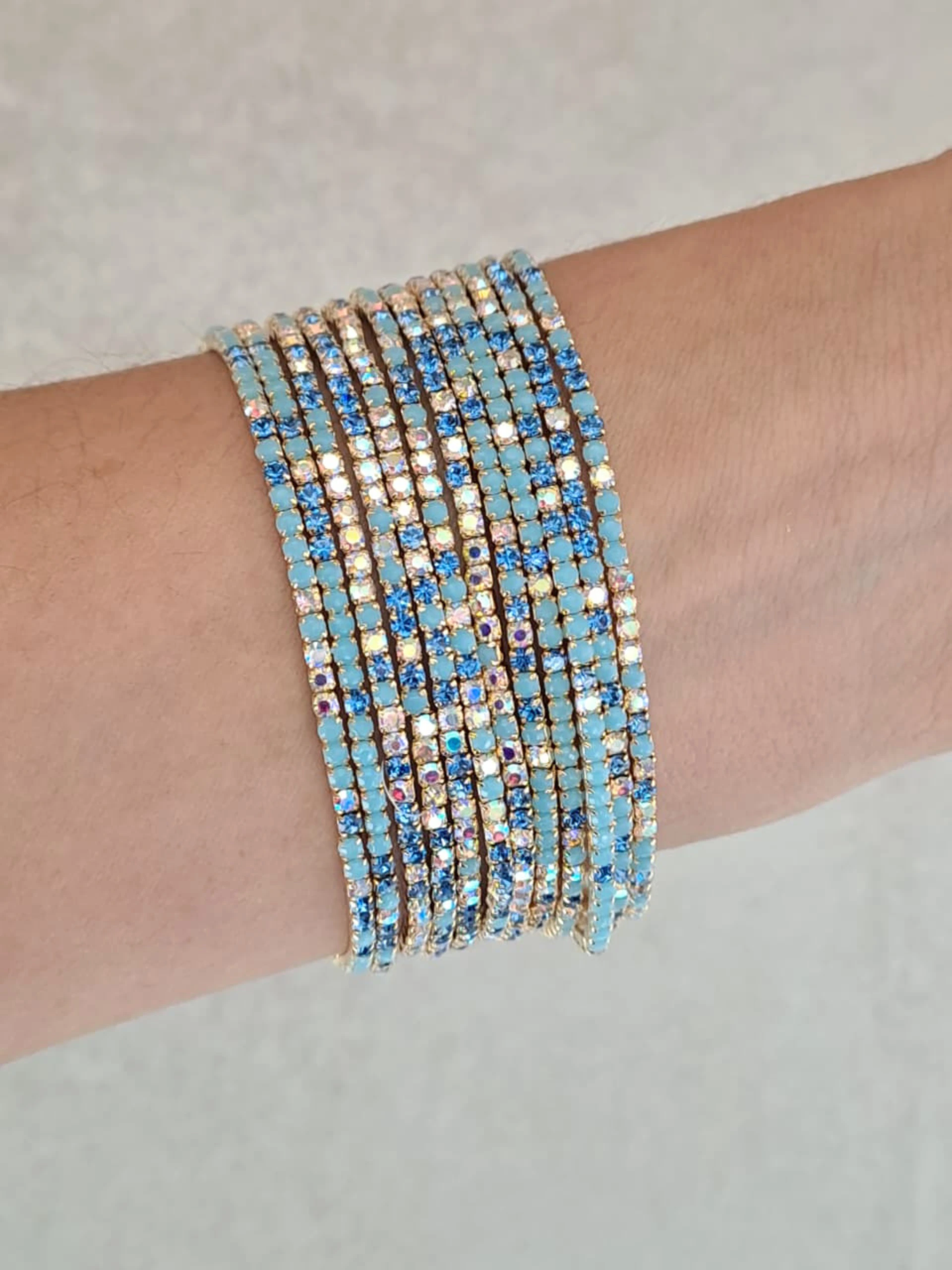 PULSERA X12 DORADO